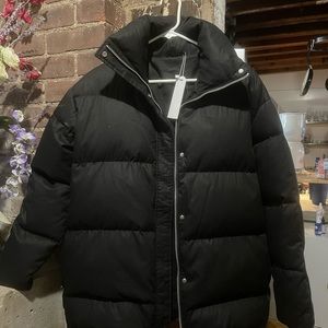 NWT black puffer jacket from The Curated